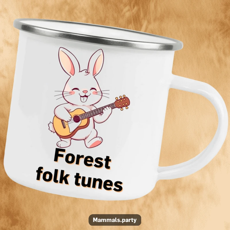 Funny camping mug featuring a grinning rabbit playing a small guitar, perfect for enjoying beverages during outdoor excursions.