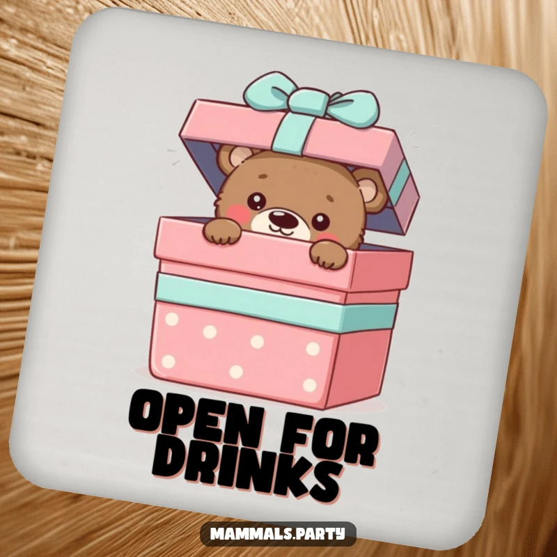 Funny drink coaster of a curious bear cub peeking out from a giant gift box, full of playful wonder.