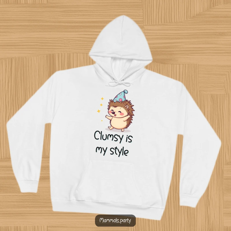 Funny Kawaii Hedgehog in a silly hat, attempting an awkward dance, a comfortable hoodie designed for cozy, playful moments.