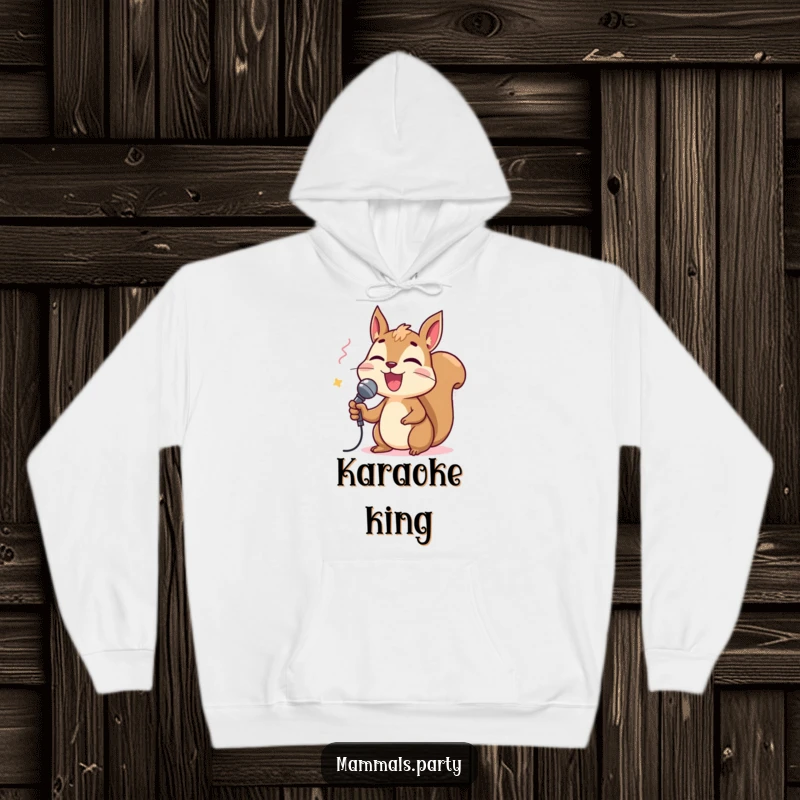Funny squirrel character holding a tiny microphone and singing karaoke on a cozy hoodie, perfect for warm, musical, and funny moments.