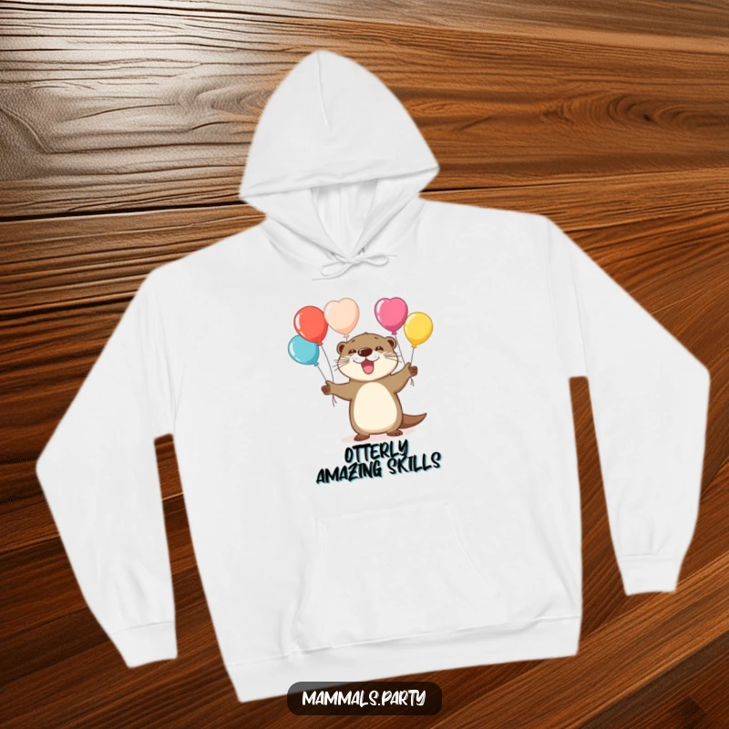Funny hoodie featuring a playful otter character juggling bright, colorful balloons, looking happy and skilled.