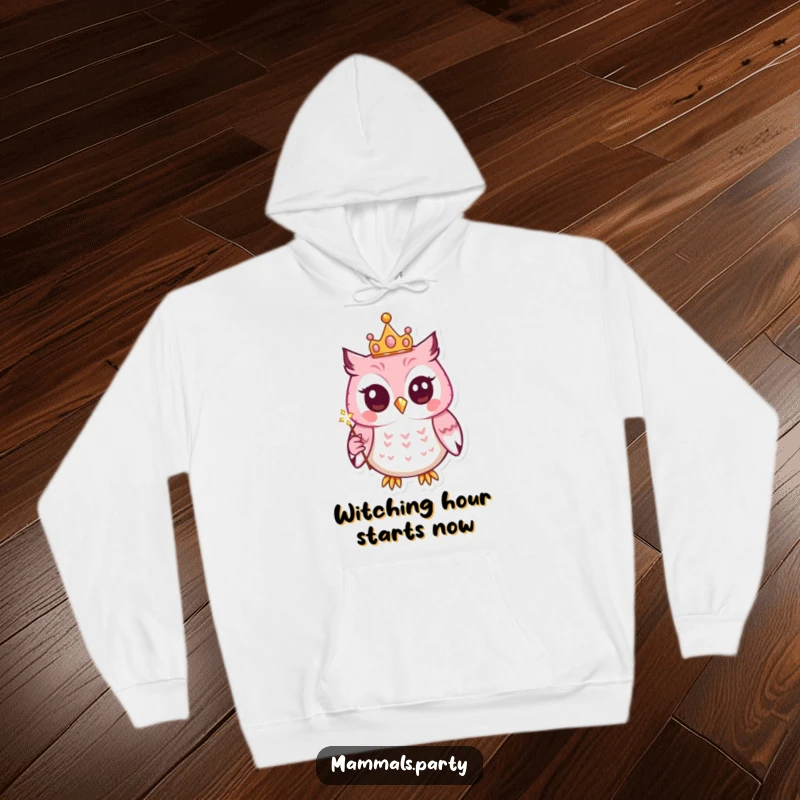 Funny hoodie showcasing a kawaii owl wearing a small crown and holding a sparkling wand, perfect for cozy, magical wear.