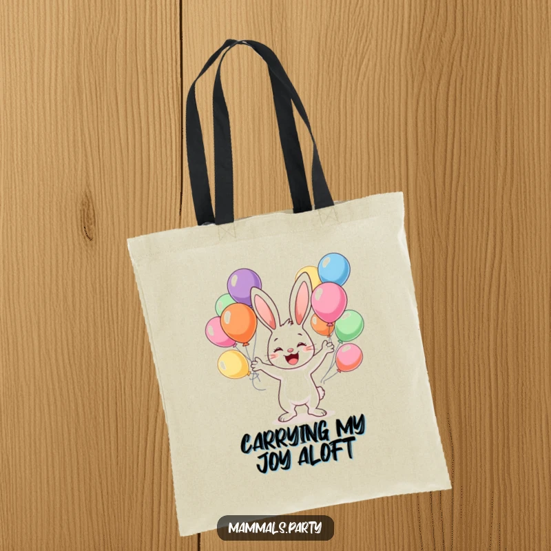 Funny tote bag featuring a happy bunny character juggling a colorful assortment of balloons, adding a touch of whimsy to your travels.