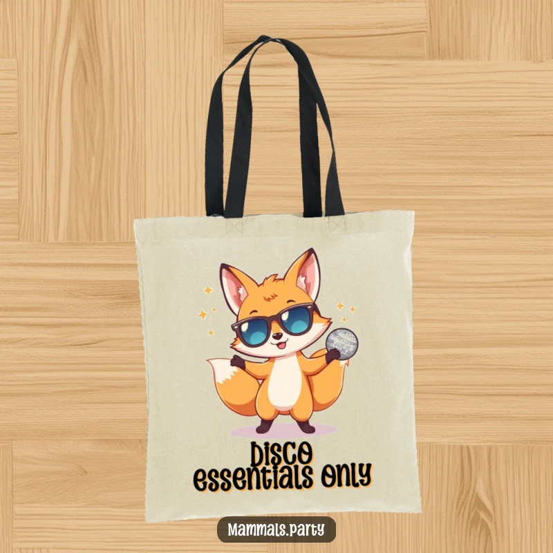 Funny tote bag featuring a happy fox in tiny sunglasses dancing with a disco ball, perfect for carrying essentials with party flair.